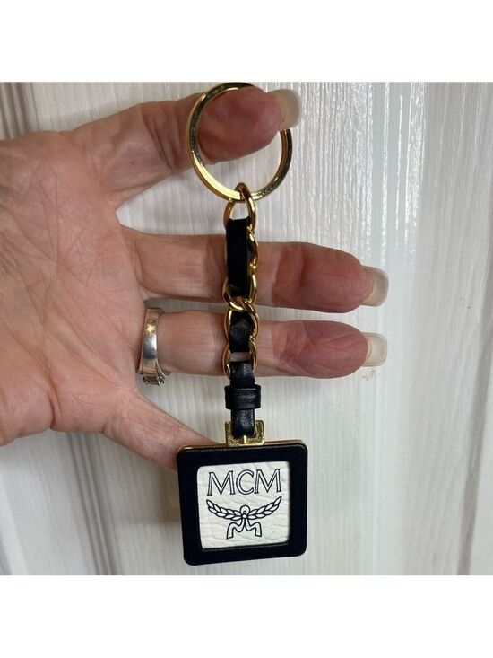 MCM Accessories - MCM LOGO BAG CHARM KEYRING KEYCHAIN BLACK GOLD VISETOS